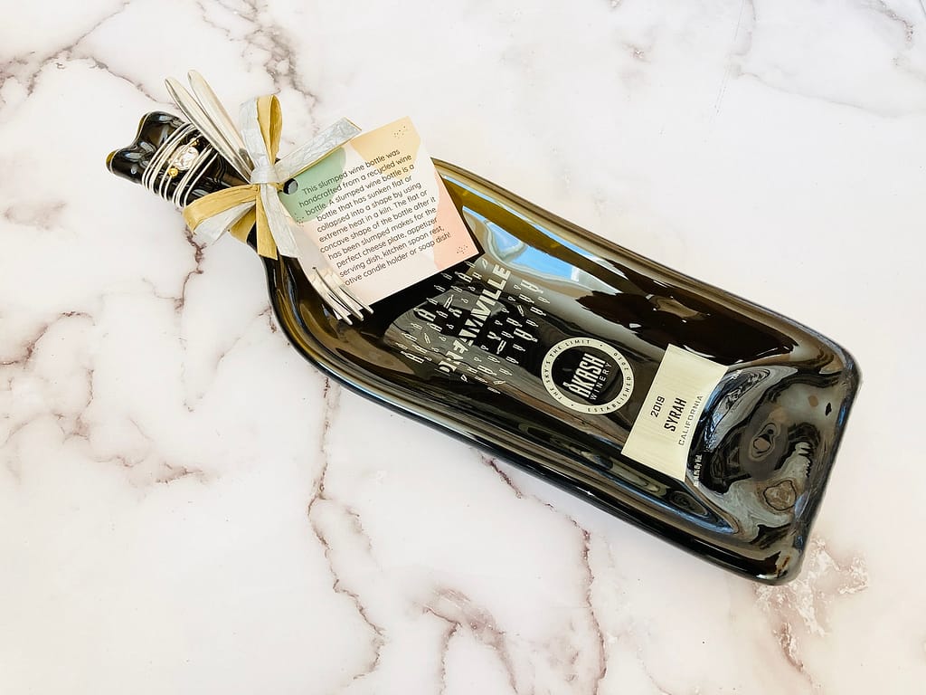 Melted Flattened Wine Bottles For Sale Pricing varies from 28 to 32