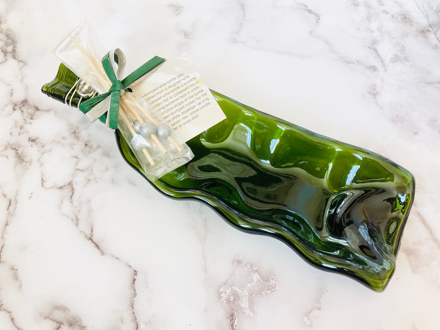 Melted Flattened Wine Bottles For Sale Pricing varies from 28 to 32