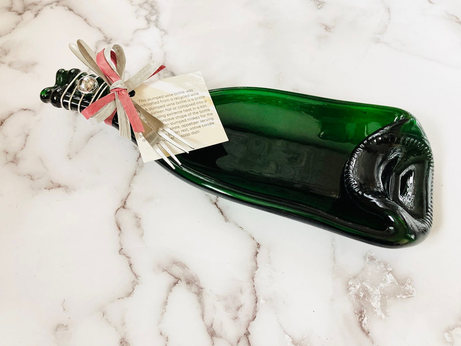 Melted Flattened Wine Bottles For Sale Pricing varies from 28 to 32