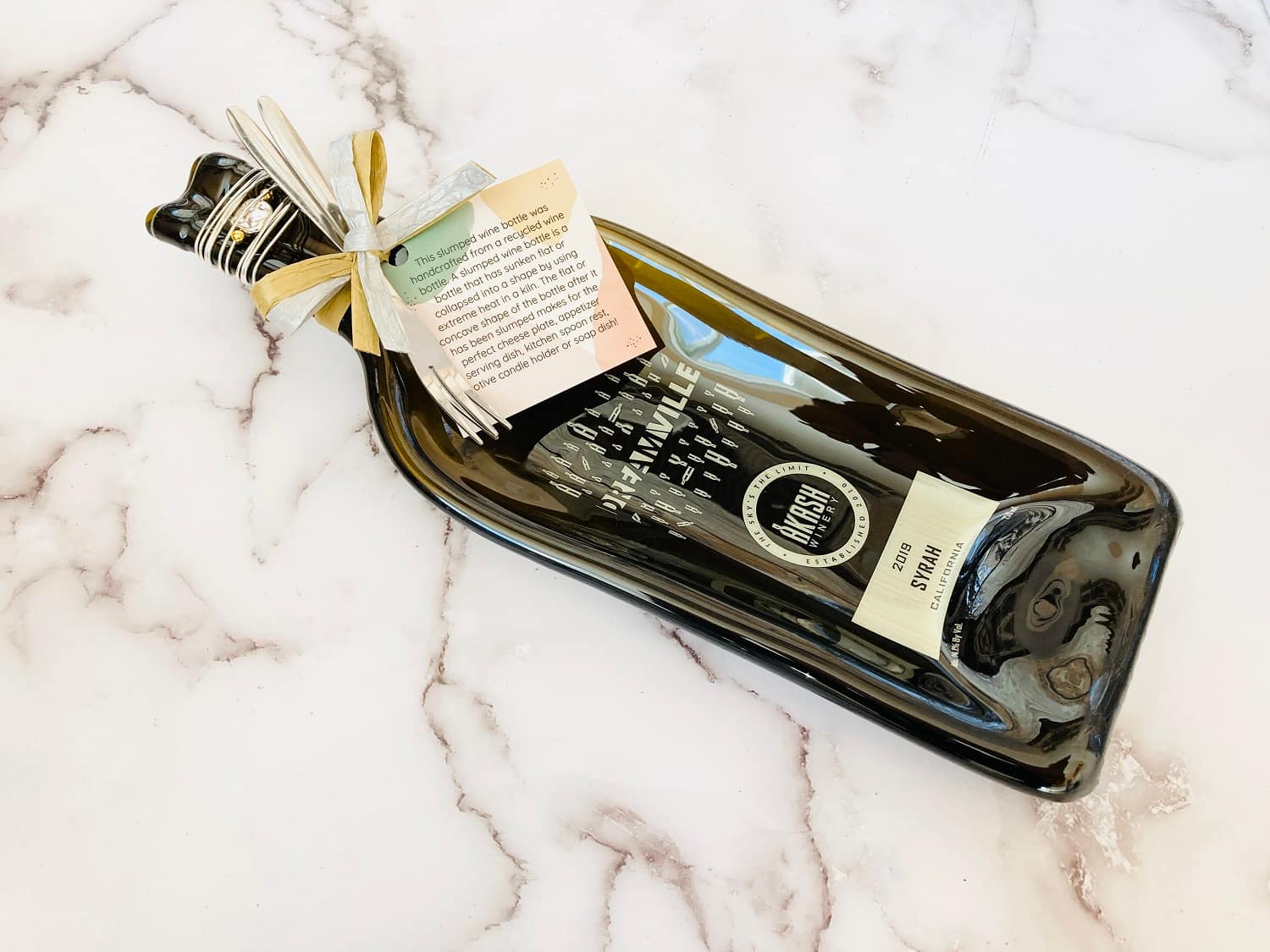 Melted Flattened Wine Bottles For Sale Pricing varies from 28 to 32